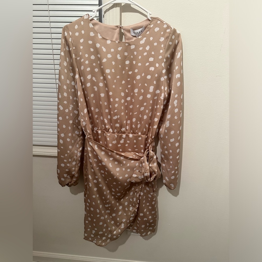 Brand new tan and white dress with wrap and tie in the front. Size small